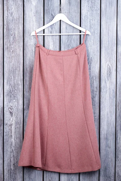 Long pink skirt on hanger. — Stock Photo, Image