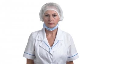 Olgun kadın cerrah el dur.