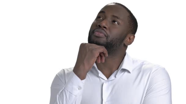 Sequence of different emotions by young black man in white shirt. — Stock Video