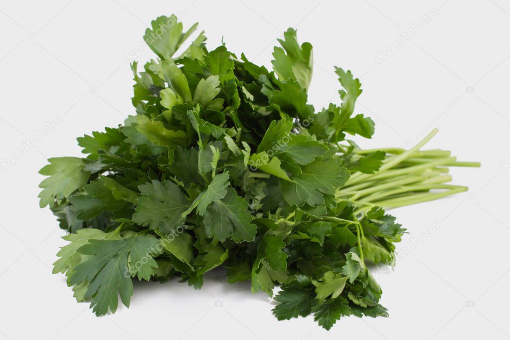 Raw green parsley isolated on white.