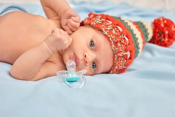 Close up portrait newborn baby lying in bed. — Stock Photo, Image