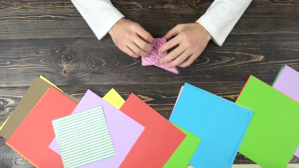 Making origami crane. — Stock Video