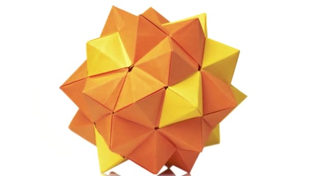 Turuncu origami dönüşüm dikenli top. — Stok video