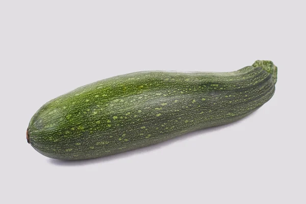 Ένα ενιαίο πράσινο κολοκυθάκι, κοντινό πλάνο. — Φωτογραφία Αρχείου