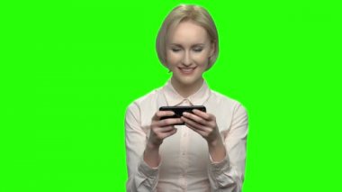 Çekici işkadını video oyunları ona telefon çalıyor..