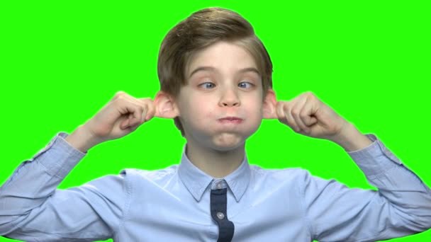 Little boy making and a funny face. — Stock Video