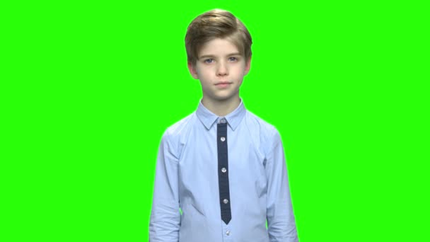 Confused child boy with i dont know gesture. — Stock Video