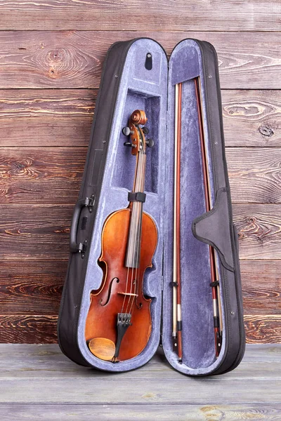 Violin in case on wooden background. — Stock Photo, Image