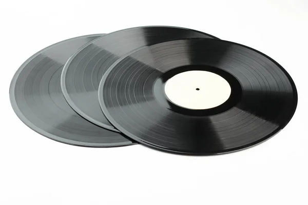 Set di dischi in vinile su sfondo bianco . — Foto Stock