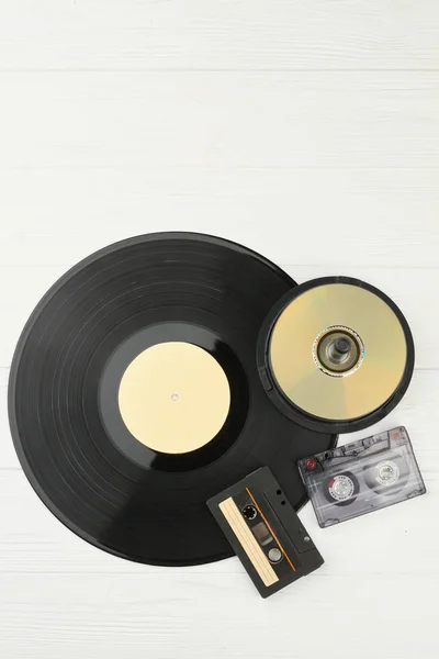 Musical technologies on wooden background. — Stock Photo, Image