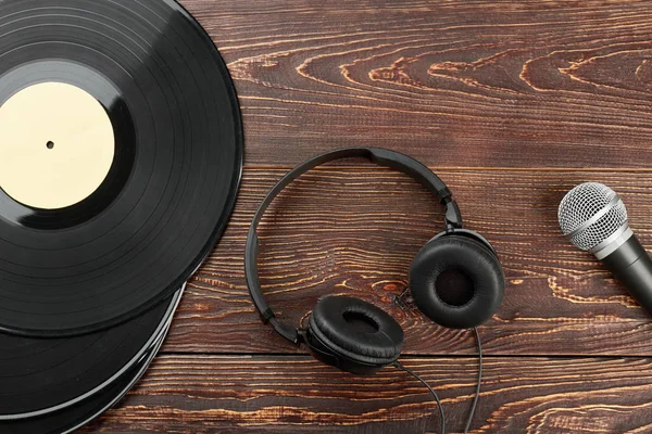 Headphones, vinyl records and microphone. Stock Picture