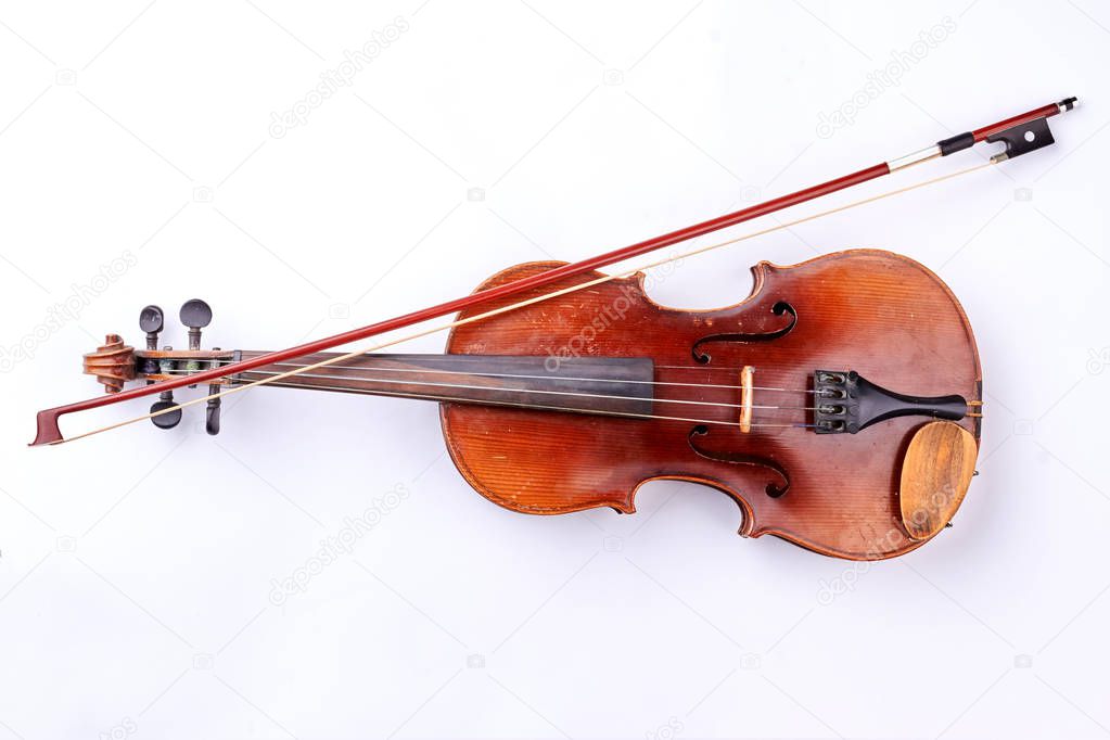 Vintage violin over white background.
