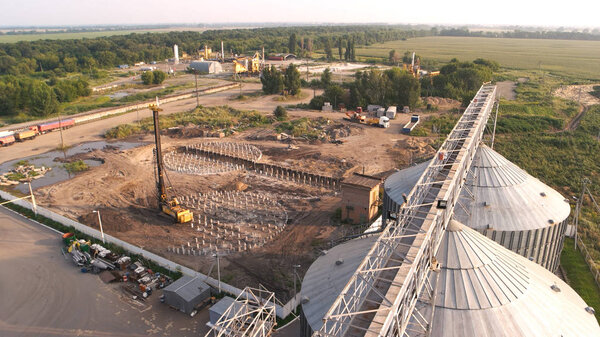 Construction of grain factory at rural location.