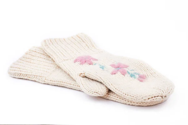 White woman knitted mittens, white background. — Stock Photo, Image