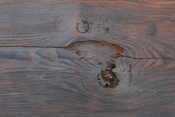Dark wooden board with cracks. — Stock Photo, Image