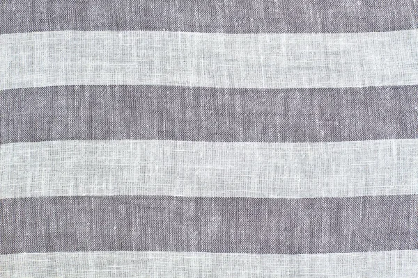Striped natural fabric background.