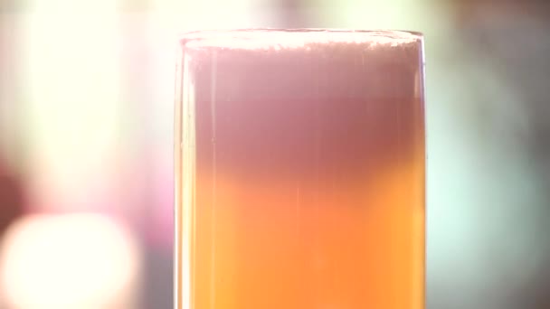 Rotating glass of ale. — Stock Video