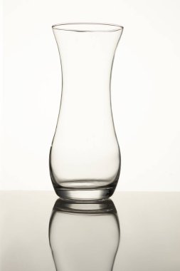 Clear glass vase isolated on a white background. clipart