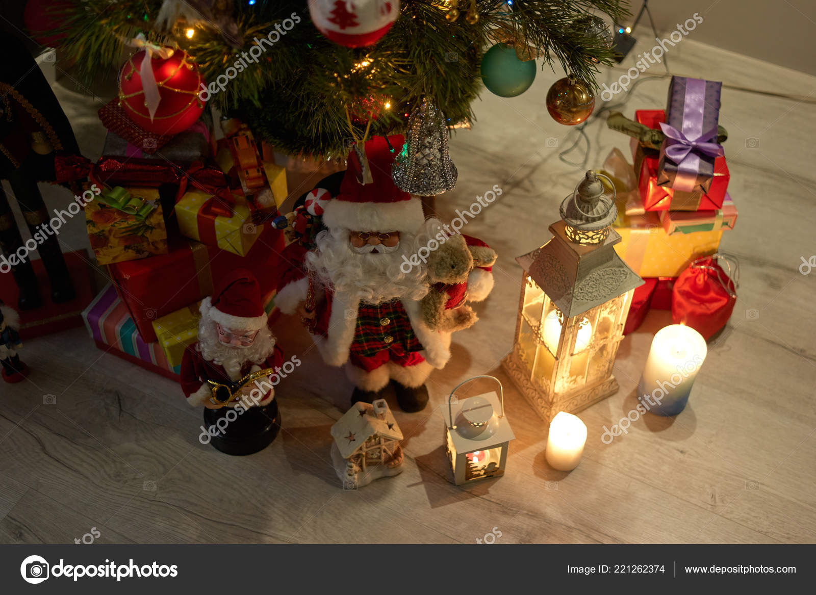 Christmas gifts and decorations under tree. — Stock Photo © Denisfilm