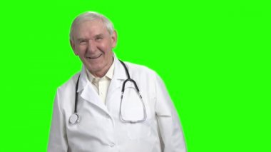 Yaşlı doktor gülüyorsun, ağır çekim.
