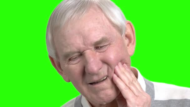 Close up old man massaging touching his cheek. — Stock Video