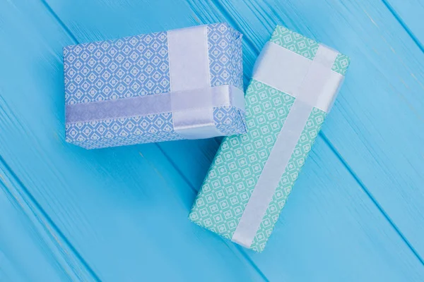 Gift boxes wrapped in patterned paper. — Stock Photo, Image