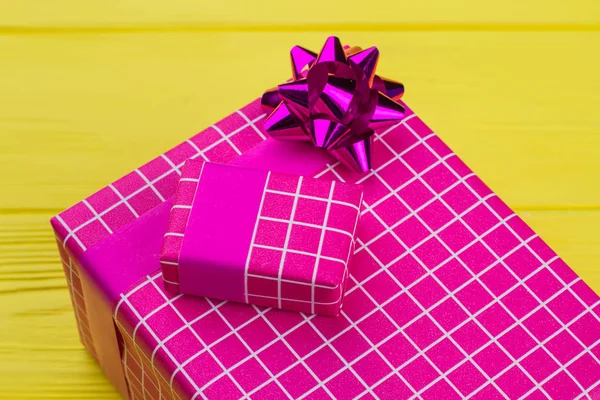 Big and small gift boxes on color background. — Stock Photo, Image