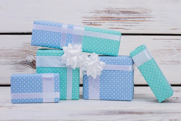 Gift boxes on wooden background. — Stock Photo, Image