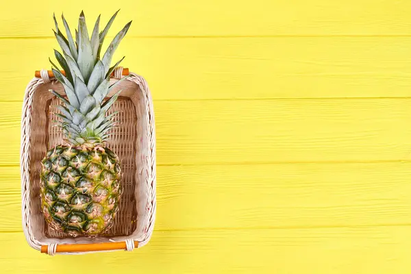 Hawaiian pineapple in basket and copy space. — Stock Photo, Image