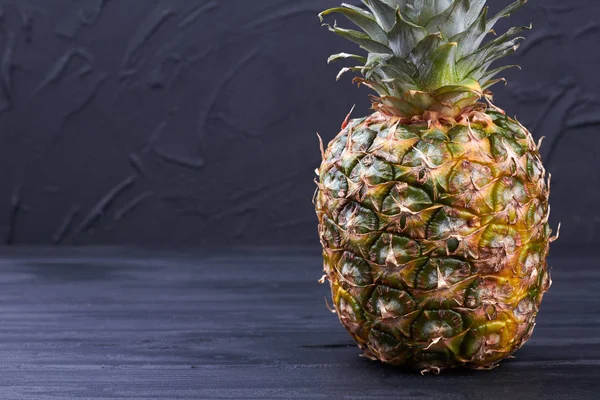 Fresh organic pineapple on dark background. — Stock Photo, Image