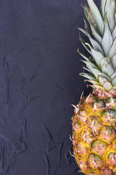 Ripe pineapple on black background. — Stock Photo, Image