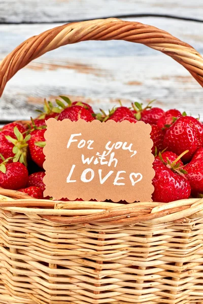 Fresh summer berries and Valentines day card.