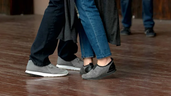 Feet of dancing couple.
