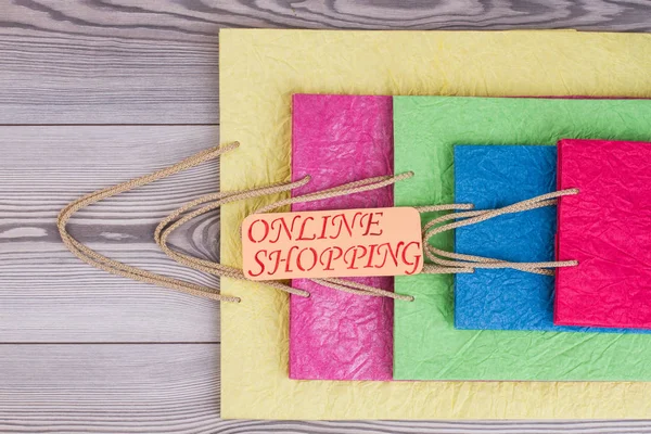 Hermosas Bolsas Compras Sobre Fondo Madera Bolsas Papel Colores Tarjeta —  Fotos de Stock