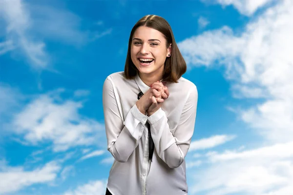 Laughing woman on cloudy sky background. — Stock Photo, Image