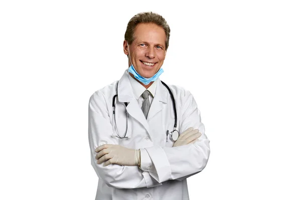 Mature caucasian doctor with arms crossed. — Stock Photo, Image