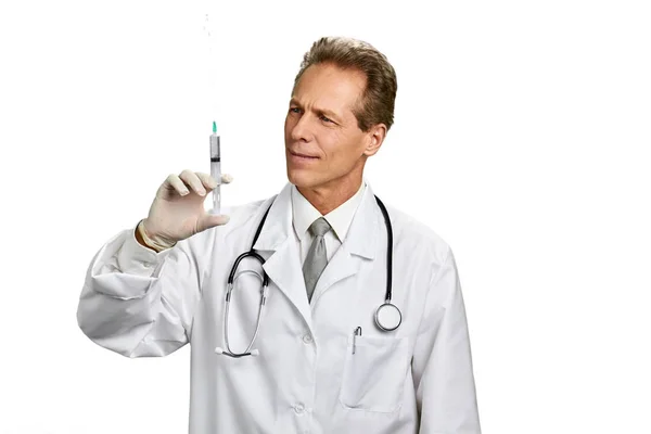 Portrait of male doctor with syringe. — Stock Photo, Image