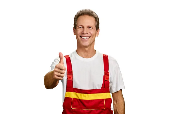 Manual worker showing thumb up sign. — Stock Photo, Image