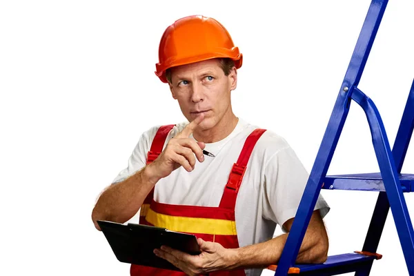 Thoughtful foreman on white background. — Stock Photo, Image