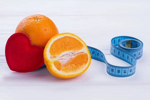 Buah jeruk, jantung dan pita pengukur . — Stok Foto