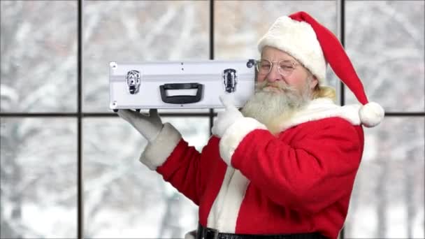 Santa posiadających wiele pieniędzy w przypadku. — Wideo stockowe