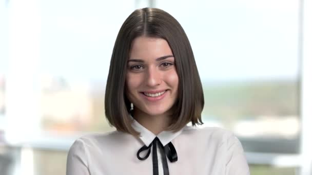 Portrait of attractive young brunette woman. — Stock Video