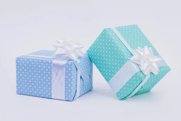 Gift boxes wrapped in blue paper. — Stock Photo, Image