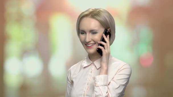 Happy office woman talking on cell phone. — Stock Video