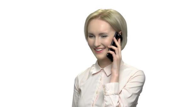 Cheerful woman in formal wear talking on phone. — Stock Video