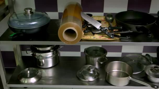 Assorted essential kitchen utensils. — Stock Video