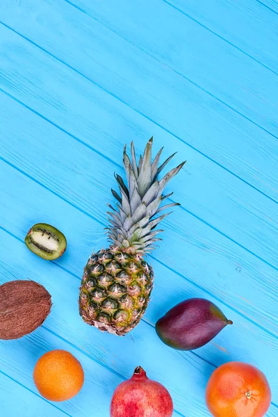 Still life of exotic fruits, top view.