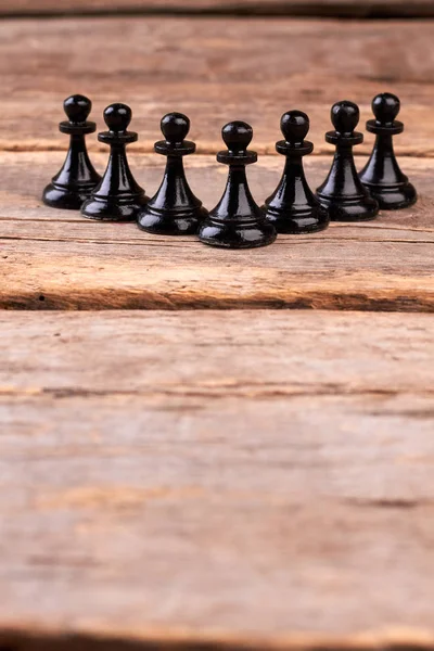 Sada černých šachy pěšáci s kopií prostor. — Stock fotografie
