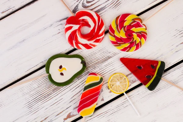 Composition with colorful lollipops, top view. — Stock Photo, Image