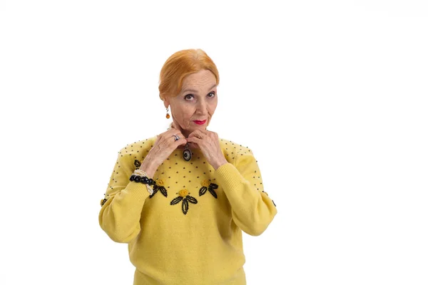 Woman touching her necklace. — Stock Photo, Image